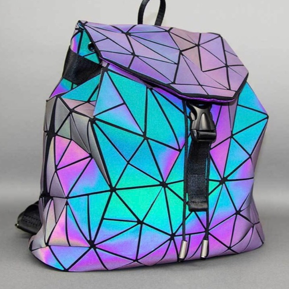 Geometric, luminous backpack. Worn once. 2 pockets